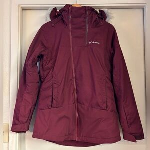 Maroon women’s ski or snowboard jacket Columbia.
